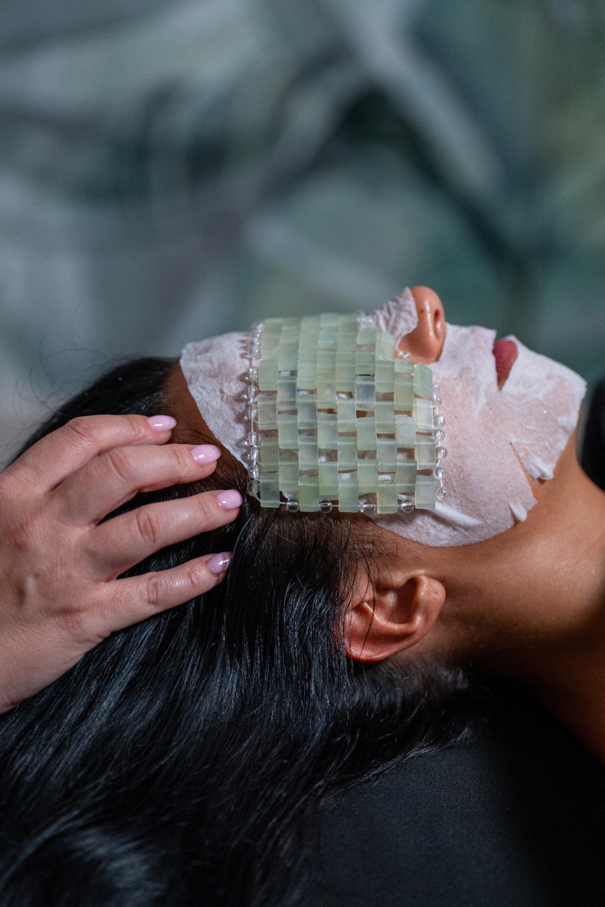 Maschera in giada durante un rituale viso